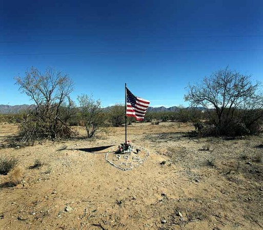 TOHONO O'ODHAM NATION, AZ - JANUARY 18: A flag honors slain U.S. Border Patrol agent Michael Gallagher on January 18, 2011 in the Tohono O'odham Nation, Arizona. Gallagher was killed by a drunk driver while patroling near the U.S.-Mexico border in the Sonoran desert September 2, 2010. The Border Patrol as well as officers from the Immigration and Customs Enforcement agency patrol the Native American reservation for drug smugglers and illegal immigrants crossing into the United States. (Photo by John Moore/Getty Images)