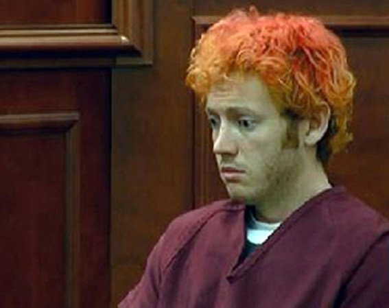 James Holmes, de 24 años, fue acusado como el autor de la matanza en Aurora, y permanece bajo arresto.