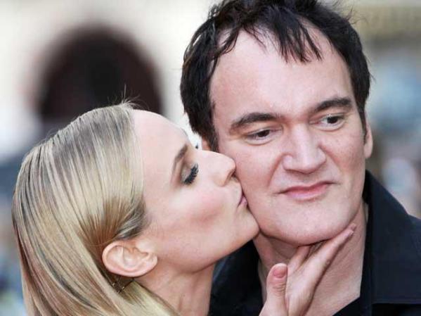 La actriz Diane Kruger felicita al director Quentin Tarantino.