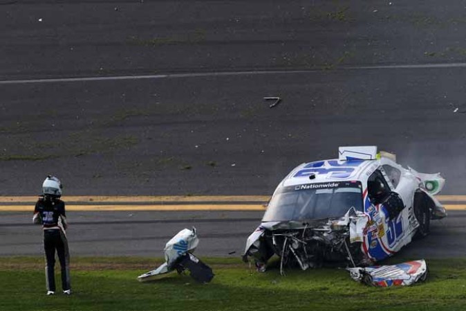 DAYTONA BEACH, FL - FEBRUARY 23: Kyle Larson, driver of the #32 Clorox Chevrolet, gets out of his car following an incident at the finish of the NASCAR Nationwide Series DRIVE4COPD 300 at Daytona International Speedway on February 23, 2013 in Daytona Beach, Florida. (Photo by Matthew Stockman/Getty Images)