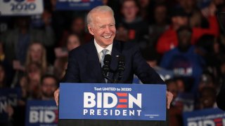 In this file photo, Democratic presidential candidate former Vice President Joe Biden celebrates with his supporters after declaring victory at an election-night rally at the University of South Carolina Volleyball Center on February 29, 2020 in Columbia, South Carolina.