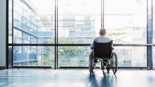Elderly Man Wheelchair Hospital Stock