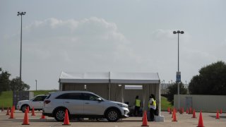 Car in line for drive-thru voting location