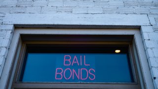 neon bail bond sign in window