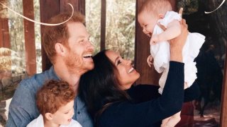 Harry and Meghan, the Duke and Duchess of Sussex, seen with their son Archie and daughter Lilibet in their 2021 holiday card.