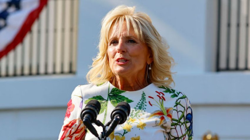 WASHINGTON, DC – JULY 04: U.S. first lady Jill Biden speaks as President Joe Biden looks on at the White House on July 04, 2022 in Washington, DC. The Bidens were hosting a Fourth of July BBQ and concert with military families and other guests on the south lawn of the White House. (Photo by Tasos Katopodis/Getty Images)