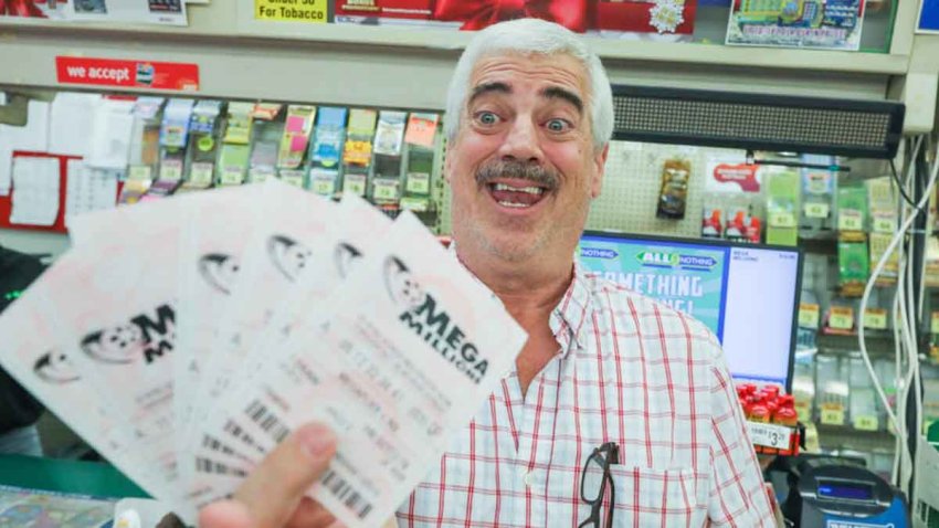 BOSTON, MA – OCTOBER 11, 2018: Kenny Mcardle of Dorchester shows off the Mega Millions tickets he purchased at the 7-eleven on Neponset ave for today’s drawing, on Thursday, October 11, 2018 in Boston, Massachusetts. (Staff photo By Nicolaus Czarnecki) (Photo by Nicolaus Czarnecki/MediaNews Group/Boston Herald via Getty Images)