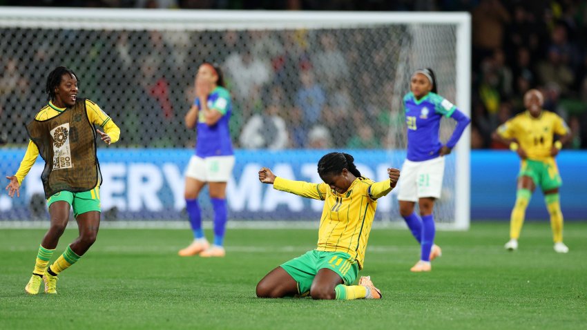 MELBOURNE, AUSTRALIA – AUGUST 02: Khadija Shaw of Jamaica celebrates qualifying to the knockout stage after the scoreless draw in the FIFA Women’s World Cup Australia & New Zealand 2023 Group F match between Jamaica and Brazil at Melbourne Rectangular Stadium on August 02, 2023 in Melbourne, Australia. (Photo by Elsa – FIFA/FIFA via Getty Images)