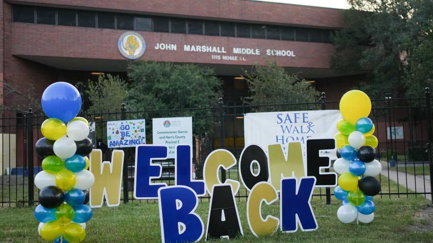 HOUSTON, TEXAS – AUGUST 12: Signs greet Marshall Middle School students for their first day of school on Monday, Aug. 12, 2024 in Houston. (Elizabeth Conley/Houston Chronicle via Getty Images)