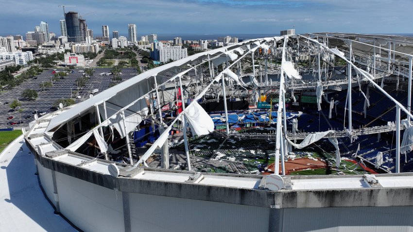 ST PETERSBURG – OCTOBER 10:  In this aerial view, the roof of Tropicana Field is seen in tatters after Hurricane Milton destroyed it as the storm passed through the area on October 10, 2024, in St. Petersburg, Florida. The storm made landfall as a Category 3 hurricane in the Siesta Key area of Florida, causing damage and flooding throughout Central Florida. (Photo by Joe Raedle/Getty Images)