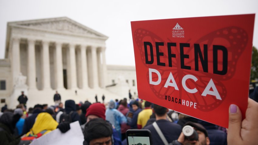 Immigration rights activists take part in a rally in front of the US Supreme Court in Washington, DC on November 12, 2019. – The US Supreme Court hears arguments on November 12, 2019 on the fate of the “Dreamers,” an estimated 700,000 people brought to the country illegally as children but allowed to stay and work under a program created by former president Barack Obama.Known as Deferred Action for Childhood Arrivals or DACA, the program came under attack from President Donald Trump who wants it terminated, and expired last year after the Congress failed to come up with a replacement. (Photo by MANDEL NGAN / AFP) (Photo by MANDEL NGAN/AFP via Getty Images)