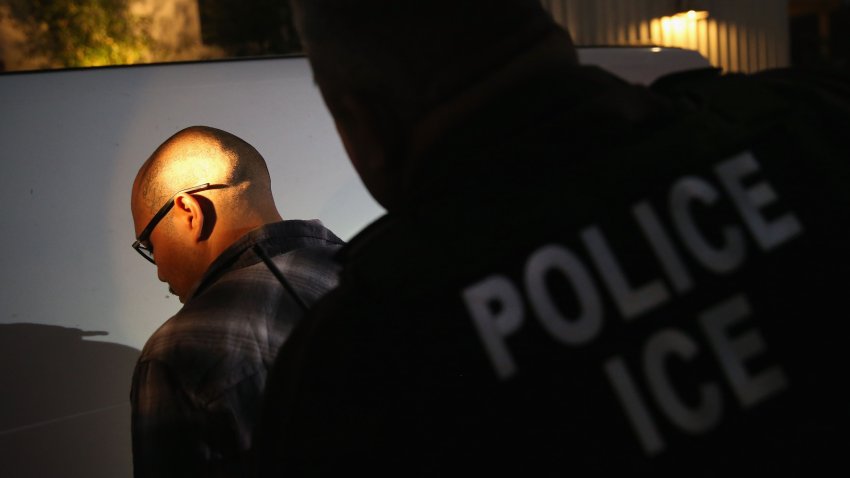 NORTHRIDGE, CA – OCTOBER 14:  A man is detained by Immigration and Customs Enforcement (ICE), agents early on October 14, 2015 in Los Angeles, California. ICE agents said the undocumented immigrant was a convicted criminal and gang member who had previously been deported to Mexico and would be again. ICE builds deportation cases against thousands of undocumented immigrants, most of whom, they say, have criminal records. The number of ICE detentions and deportations from California has dropped since the state passed the Trust Act in October 2013, which set limits on California law enforcement cooperation with federal immigration authorities.  (Photo by John Moore/Getty Images)