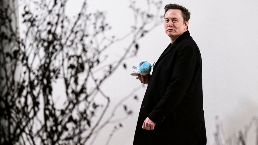 Washington, DC – February 19 : Elon Musk carries a stuffed Air Force One as he walks back to the West Wing along the colonnade after returning to the White House on Marine One with President Donald J Trump on Wednesday, Feb 19, 2025 in Washington, DC. (Photo by Jabin Botsford/The Washington Post via Getty Images)