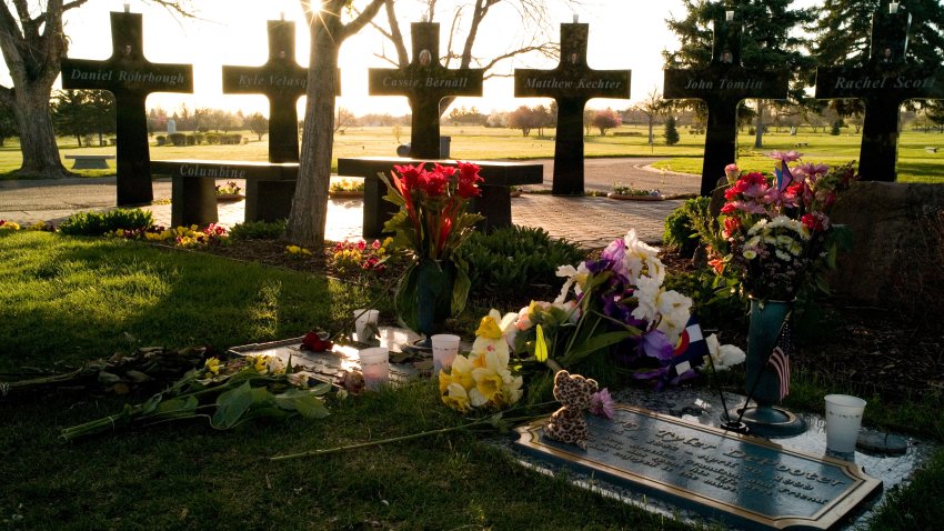 LITTLETON, CO – APRIL 20:  A memorial for 13 victims stands around the graves of three of the Columbine High School shooting victims, including Rachel Scott and Corey DePooter, foreground, at Chapel Hill Memorial Gardens April 20, 2007 in Littleton, Colorado. Today marks the eighth anniversary of the Columbine shootings, which were surpassed in magnitude earlier in the week at Virginia Tech when Cho Seung-Hui, a 23-year-old South Korean undergraduate student, killed 33 people including himself.  (Photo by Kevin Moloney/Getty Images)