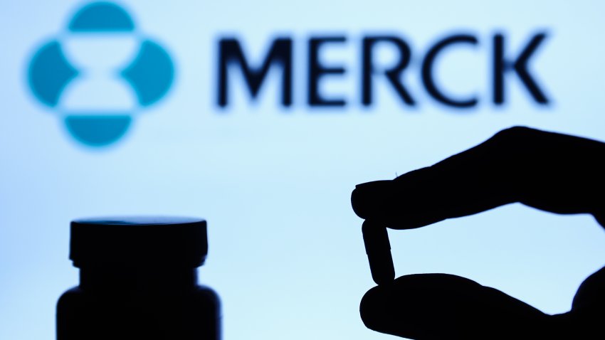 Medicine pill is seen with Merck logo displayed on a screen in the background in this illustration photo taken in Poland on October 4, 2021. (Photo by Jakub Porzycki/NurPhoto via Getty Images)
