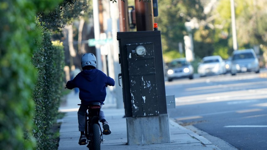 Students from Newbury Park High School ride e-bikes and e-motorcycles on the wrong side of the street and on sidewalks on Jan. 26, 2026. Many of the e-bikes appeared to be e-motorcycles with throttles and higher speeds, and were observed being ridden on the sidewalk.