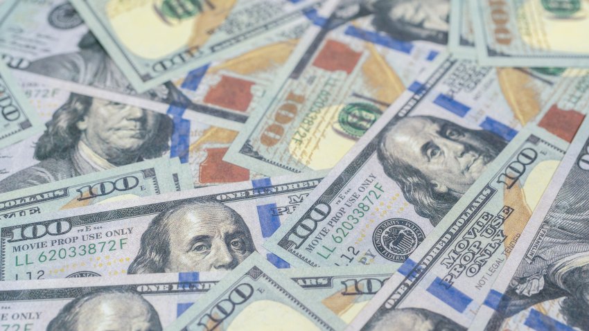 US dollars as a background.